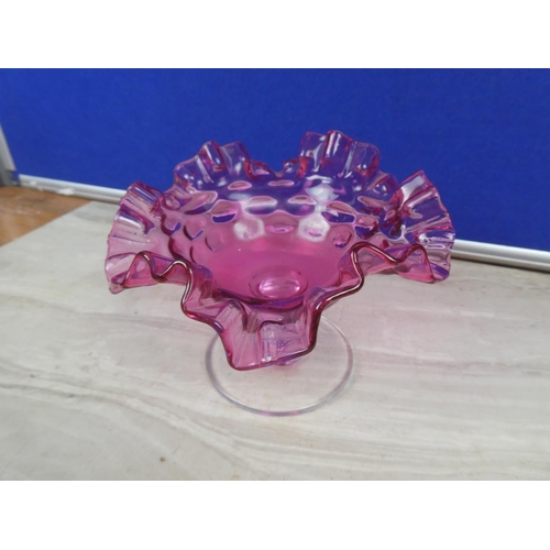 283 - A stunning ruby glass bonbon dish with ruffled edges.