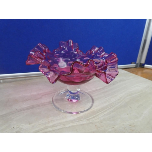 283 - A stunning ruby glass bonbon dish with ruffled edges.