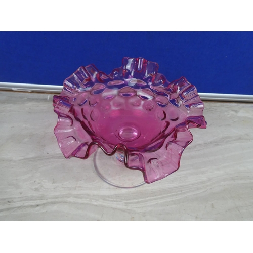 283 - A stunning ruby glass bonbon dish with ruffled edges.