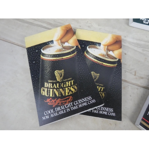 293 - A collection of vintage pub notebooks to include Guinness, Smithwick's and more.