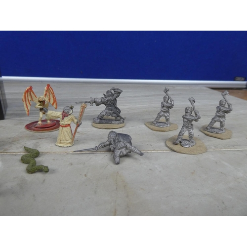 334 - A collection of vintage Dungeons & Dragons figures/ dice etc.