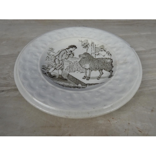 335 - A stunning antique pearlware plate with Shepherd scene. (a/f).