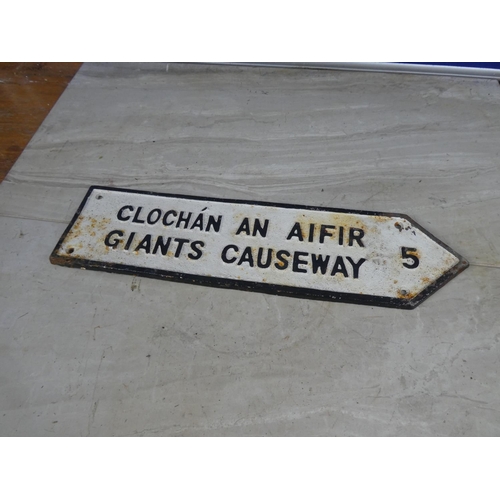 348 - A Giant's Causeway cast iron road sign.  Approx 10x39cm.