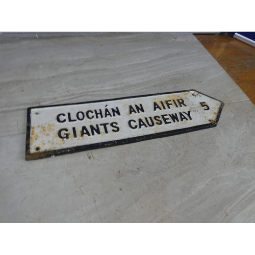 348 - A Giant's Causeway cast iron road sign.  Approx 10x39cm.