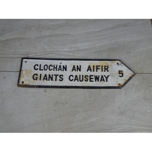 348 - A Giant's Causeway cast iron road sign.  Approx 10x39cm.