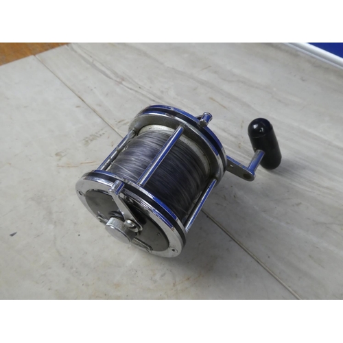 358 - A Daiwa Sea Line 200 fishing reel.