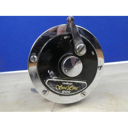 358 - A Daiwa Sea Line 200 fishing reel.