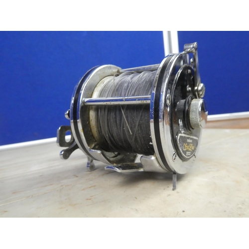 358 - A Daiwa Sea Line 200 fishing reel.