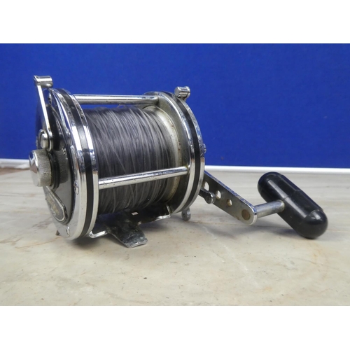 358 - A Daiwa Sea Line 200 fishing reel.