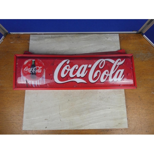 370 - A vintage Coca Cola plastic sign on a metal frame.  Approx 71x22cm.