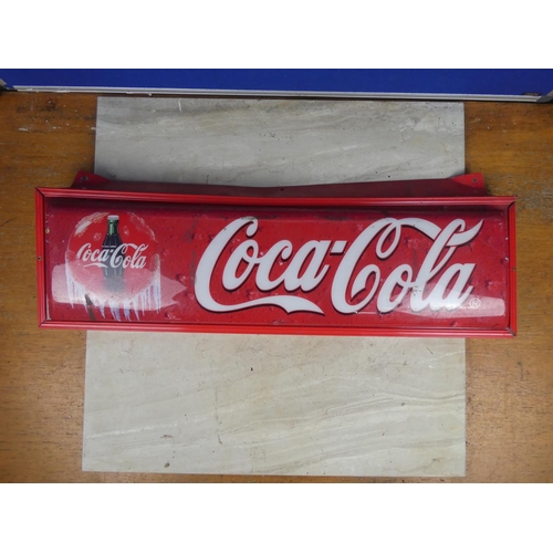 370 - A vintage Coca Cola plastic sign on a metal frame.  Approx 71x22cm.