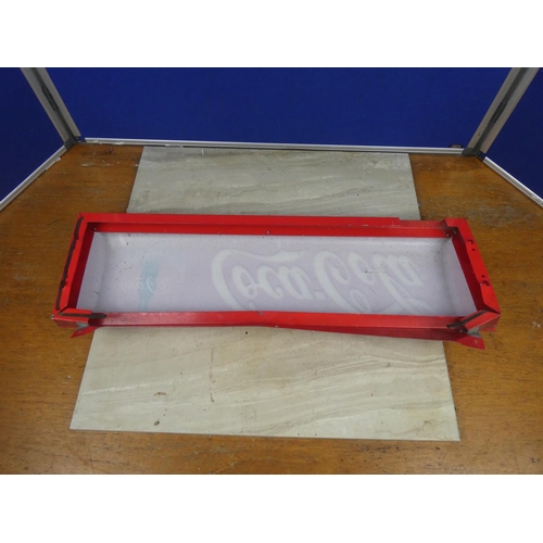 370 - A vintage Coca Cola plastic sign on a metal frame.  Approx 71x22cm.