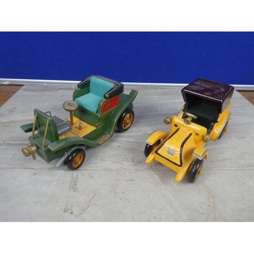 372 - Two wooden model vintage  cars.