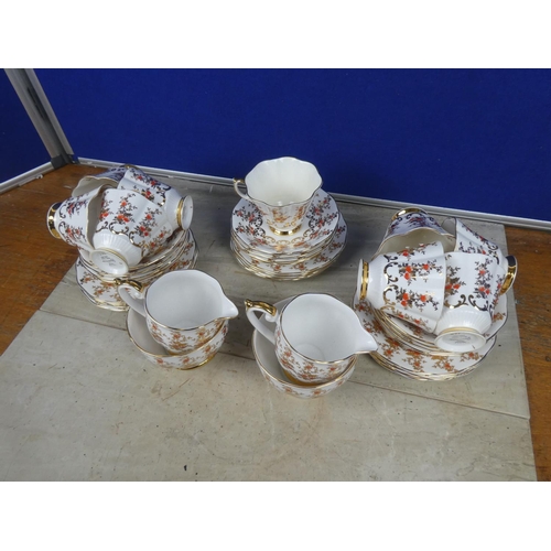 384 - A stunning Queen Anne bone china tea set.