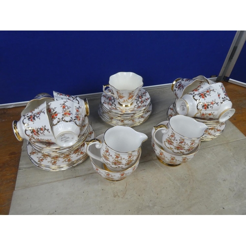 384 - A stunning Queen Anne bone china tea set.