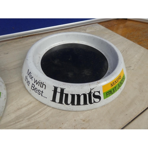 306 - Two vintage 'Hunts' metal ashtrays.