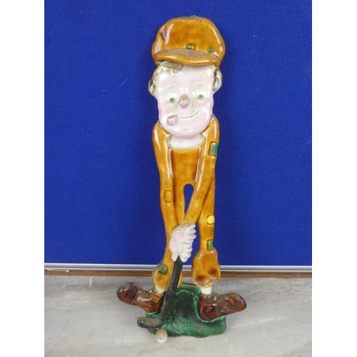 316 - A stunning ceramic figure of a golfer by Licinio, Portugal.