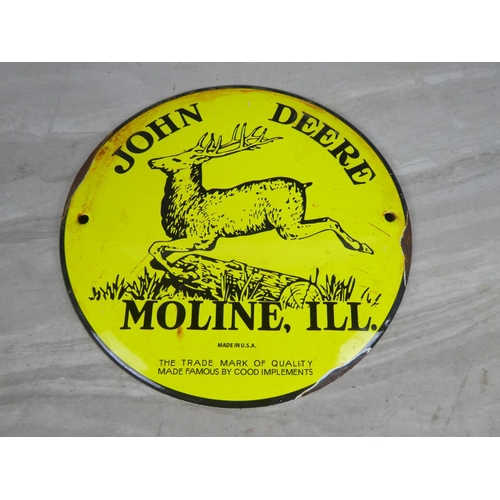 324 - A John Deere metal plaque.