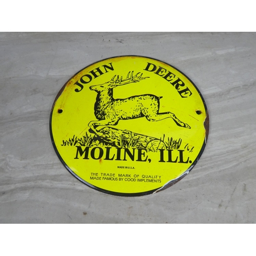 324 - A John Deere metal plaque.