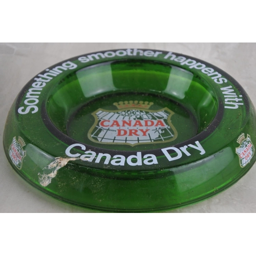 100 - A vintage Canada Dry green glass ashtray.