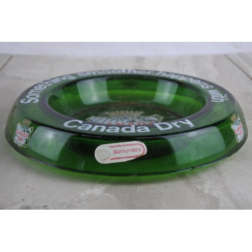 109 - A vintage Canada Dry green glass ashtray.