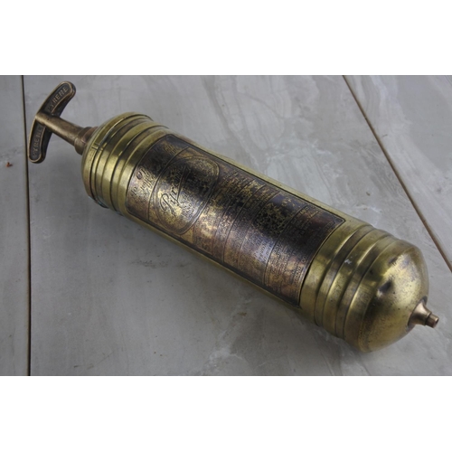 113 - A stunning vintage brass cased Pyrene fire extingusher.