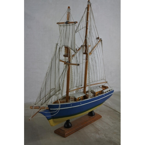 128 - A model ship.  Approx 30cm.