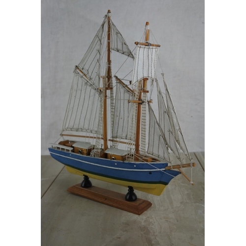 128 - A model ship.  Approx 30cm.