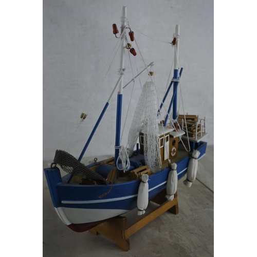 135 - A model fishing boat.  Approx 30cm.