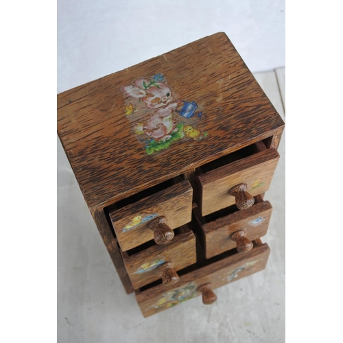 137 - A five drawer trinket chest.