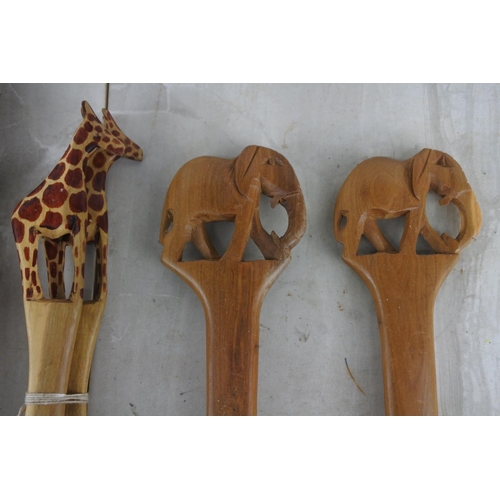 139 - Three set of wooden utensils.