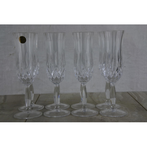 140 - A set of eight Royal Doulton lead crystal wine glasses.