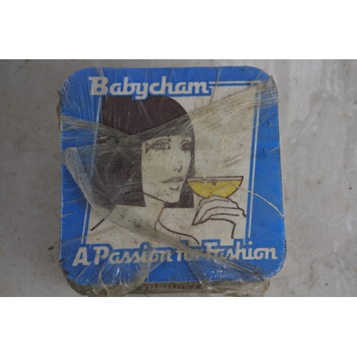 141 - A pack of unopened Babycham - A Passion for Fashion beer mats.