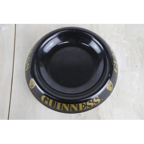 148 - A Guinness metal ashtray.