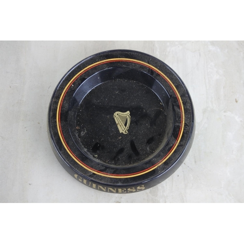 154 - A vintage Praesidium melamine Guinness ashtray.