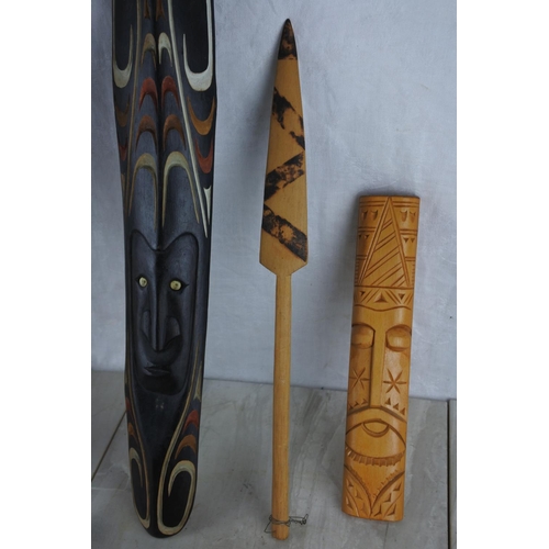 162 - A collection of various tribal masks, spear and more.