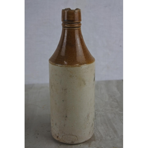 167 - An antique Andrew A Watt & Co Ltd, Londonderry stoneware beer bottle (a/f).