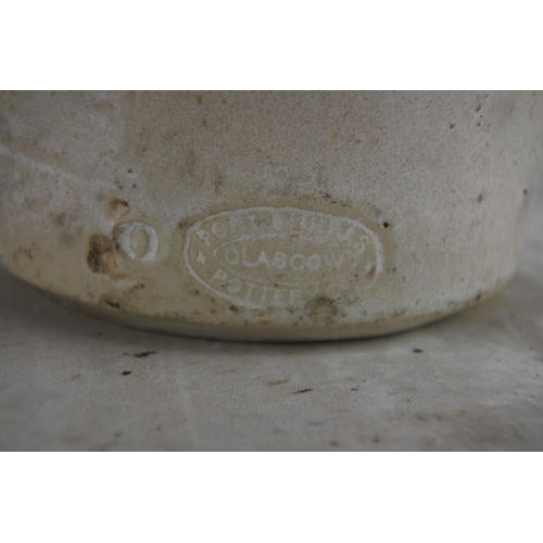 167 - An antique Andrew A Watt & Co Ltd, Londonderry stoneware beer bottle (a/f).