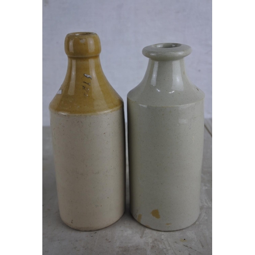 172 - Two antique stoneware bottles.