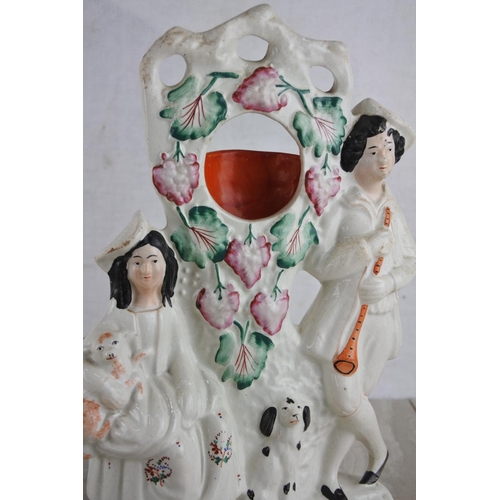 181 - An antique Staffordshire figurine (a/f).  Approx 30cm.