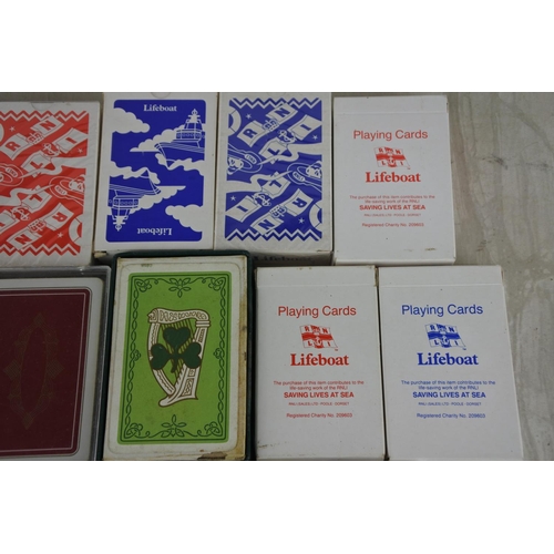 188 - A large lot of vintage RNLI Lifeboat playing cards and more.