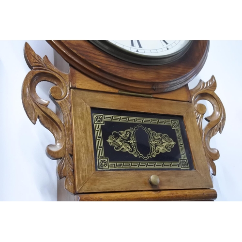 197 - A stunning mahogany cased drop dial wall clock.  Approx 70cm.