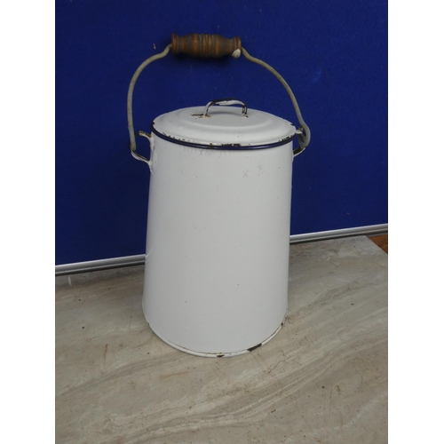 401 - A vintage white enamel milk pail.   Approx 25cm.