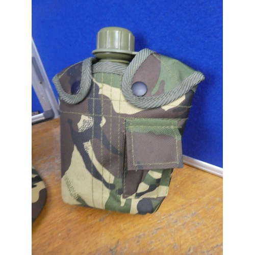 406 - An army camouflage holdall, helmet, water bottle and more.