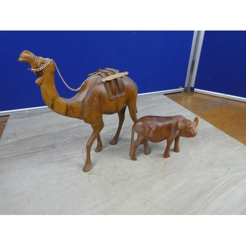 407 - A vintage wooden camel and bull.