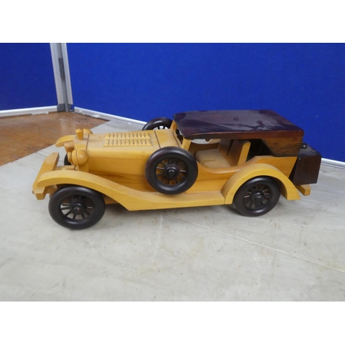 408 - A wooden model vintage car.