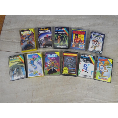 421 - A collection of vintage Spectrum game cassette tapes.