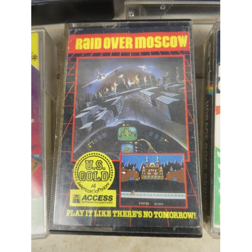 421 - A collection of vintage Spectrum game cassette tapes.