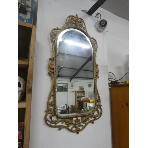 431 - A decorative framed wall mirror.  Approx 42x84cm.