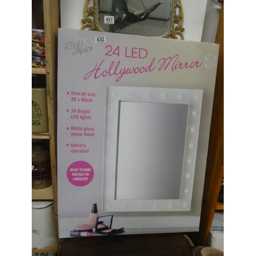 432 - A boxed LED light mirror.   Approx 80x60cm.